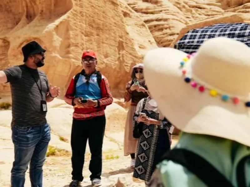 Travellers with a guide on a Golden Triangle tour